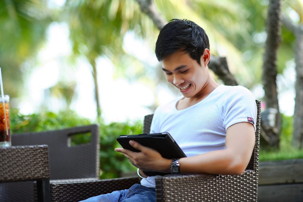 Young man checking financial accounts